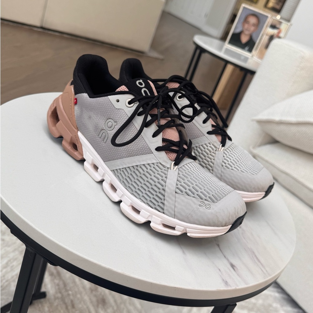 On Running Tan and Gray Athletic Shoes with Geometric Sole